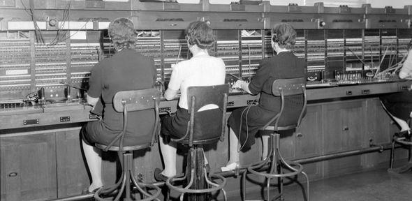 Southern Bell Telephone Co Employees, female switchboard operators, at work.