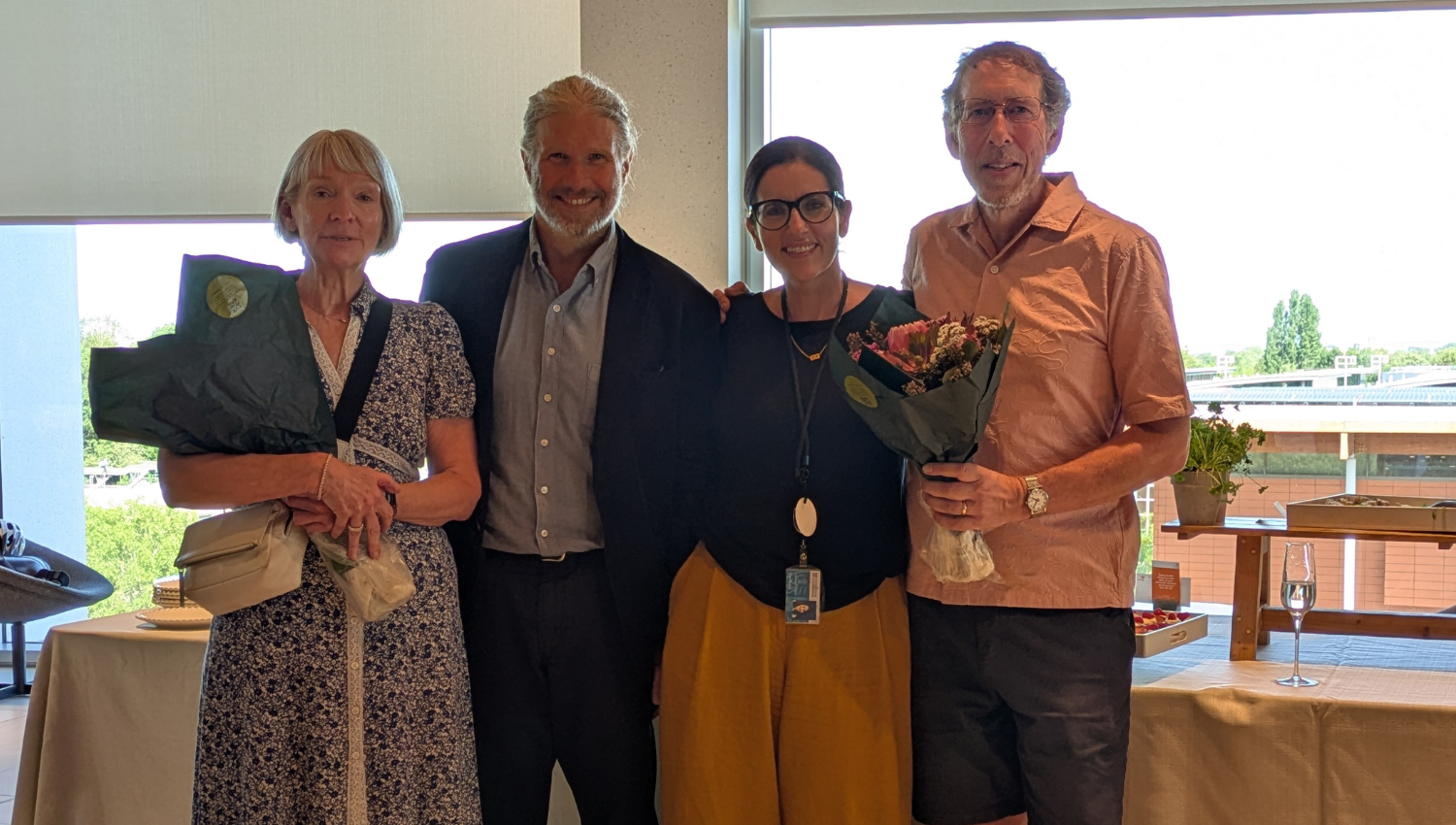 Image description: Left to right: Helen Marshall; Prof. Mete Atatüre, Head of Department; Sam Stokes, Head of Operations; and Richard King during Helen and Richard's farewell party.
