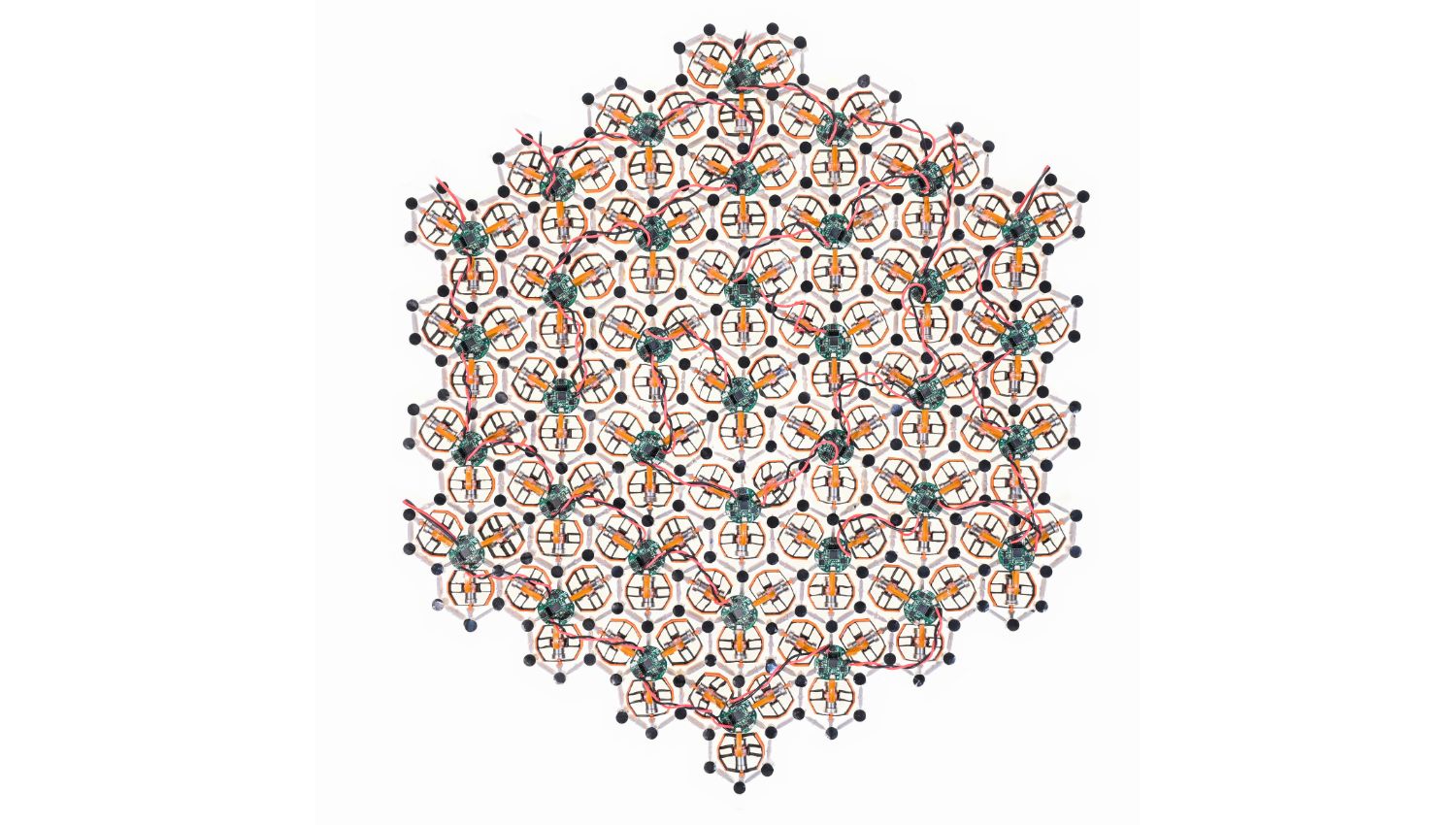 Tiny robots forming a two-dimensional surface.